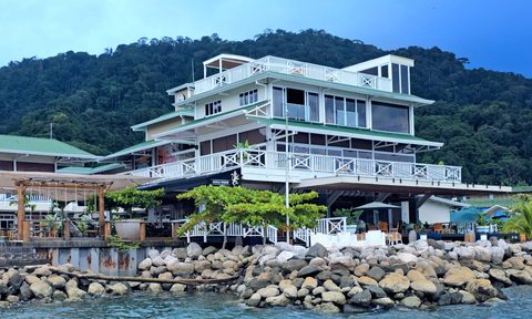 A view of Amaka Ocean Living Lodge from the water