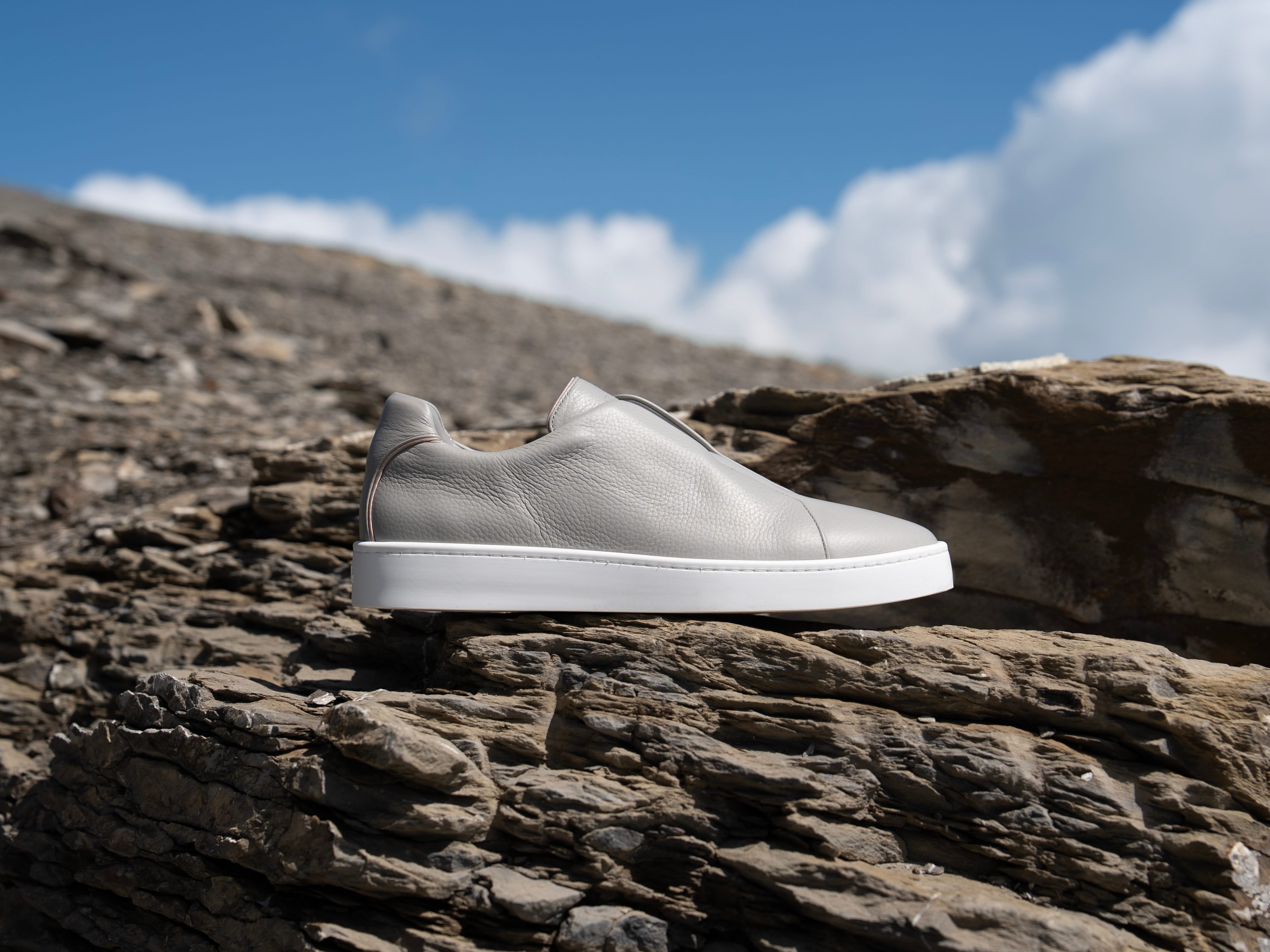 Shoe on mountaintop