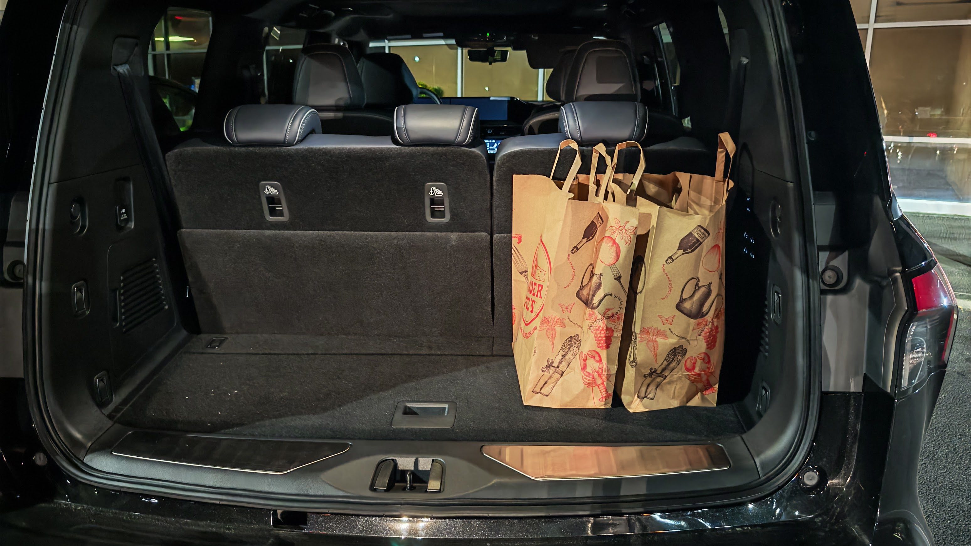 Infiniti QX80 Sport trunk with Trader Joes bags
