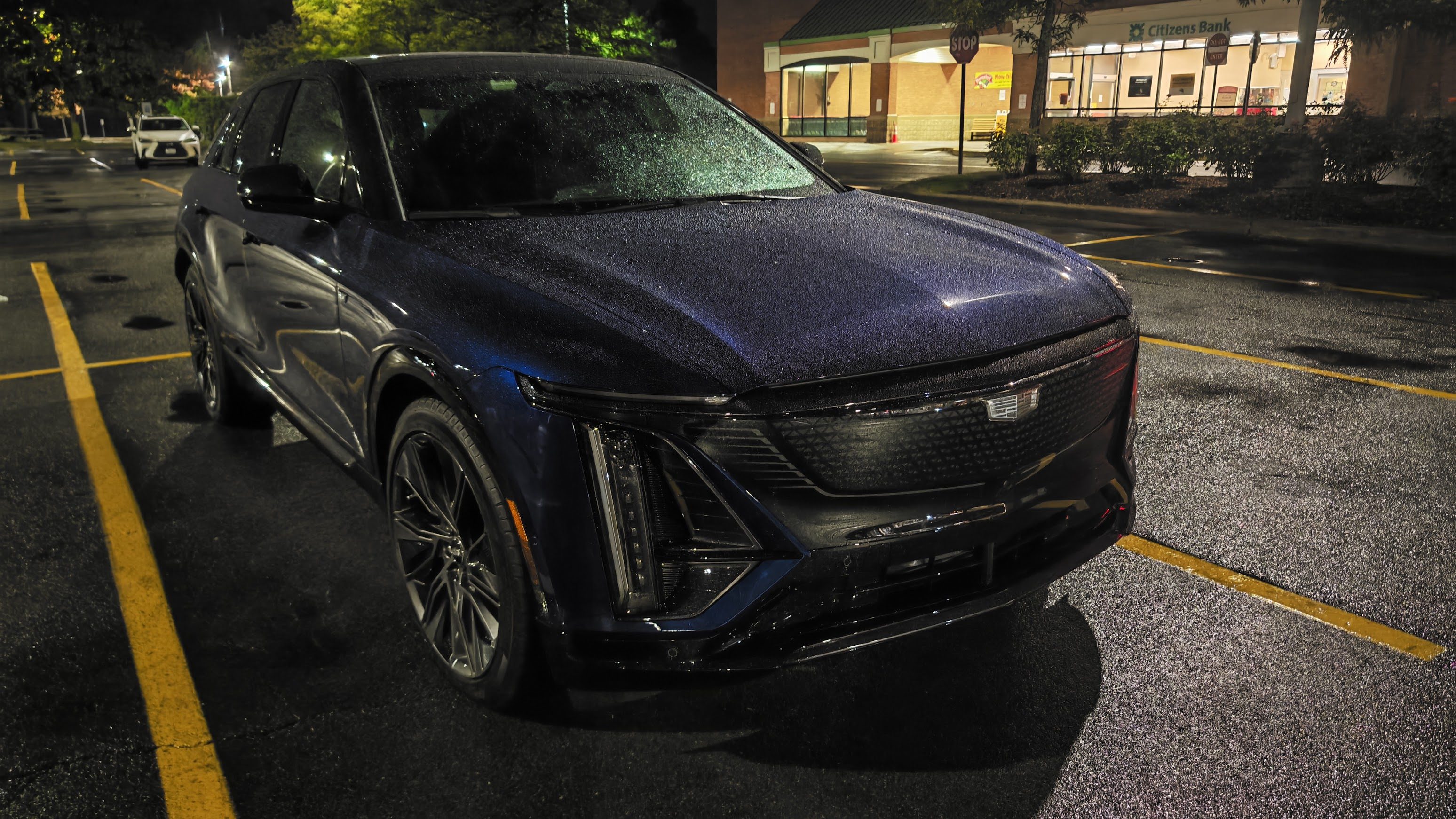 Front 3/4 view of a 2026 Cadillac Lyriq at night