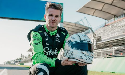 Nico Hulkenberg holding his Mexico City Grand Prix helmet.