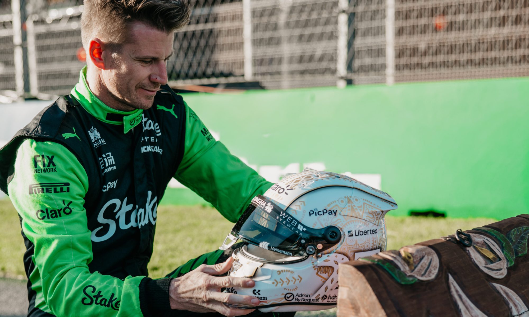 Nico Hulkenberg looking at his Mexico City Grand Prix helmet.