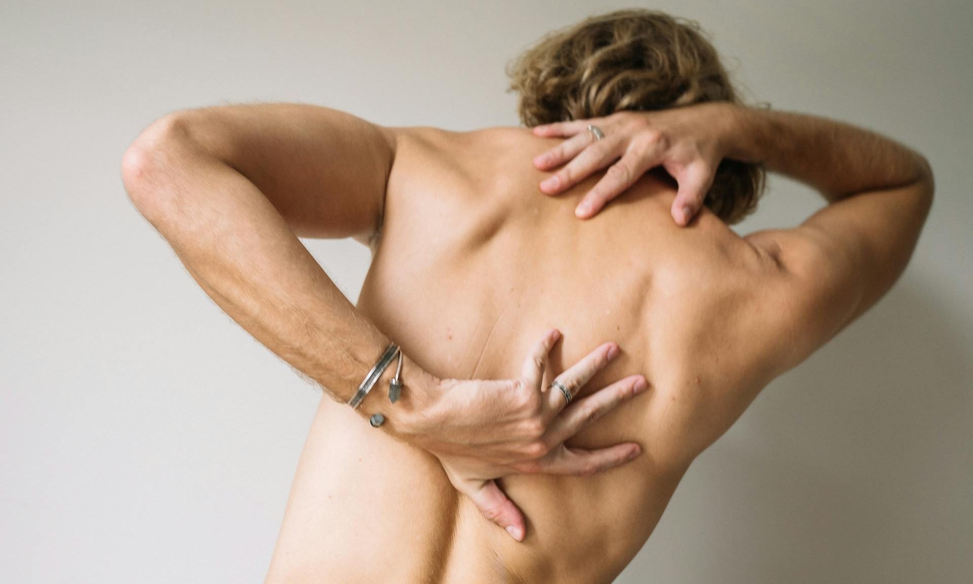 Pain man in pain on back