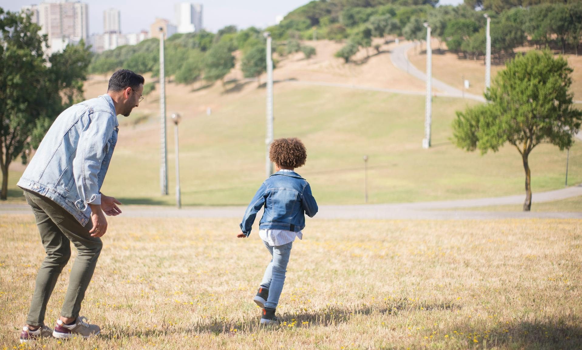 kid and dad running playing