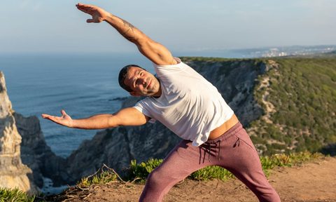 man doing yoga stretch