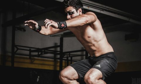 man jumping box jump