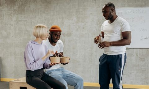 people hanging out in a gym