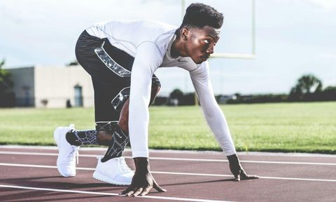 guy getting ready to run and sprint