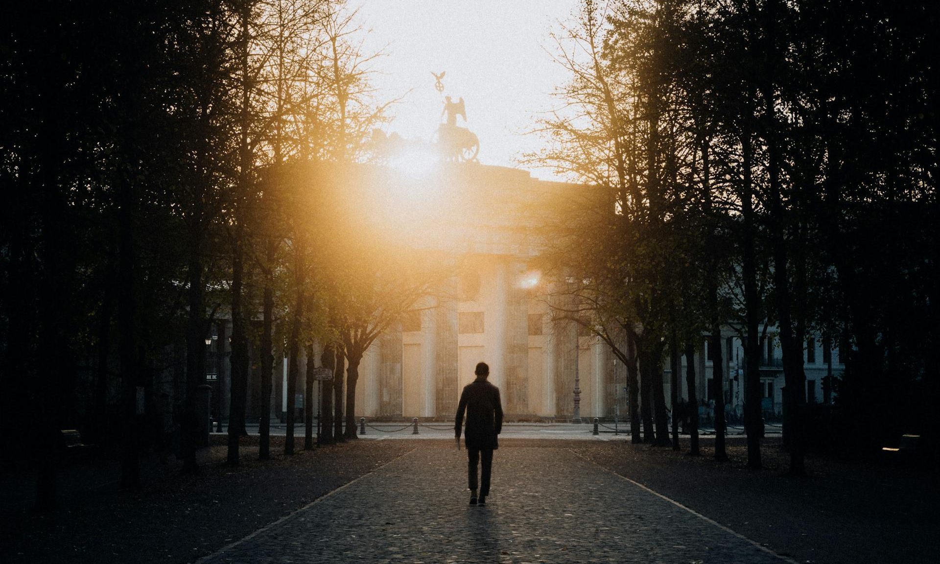 man walking morning sunrise