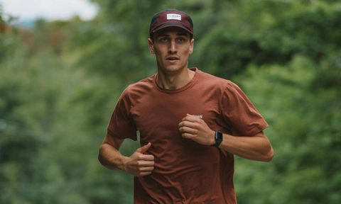 man running fitness tracker watch