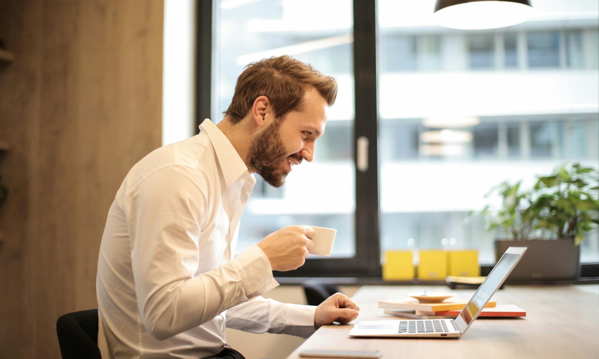 man working at a computer desk