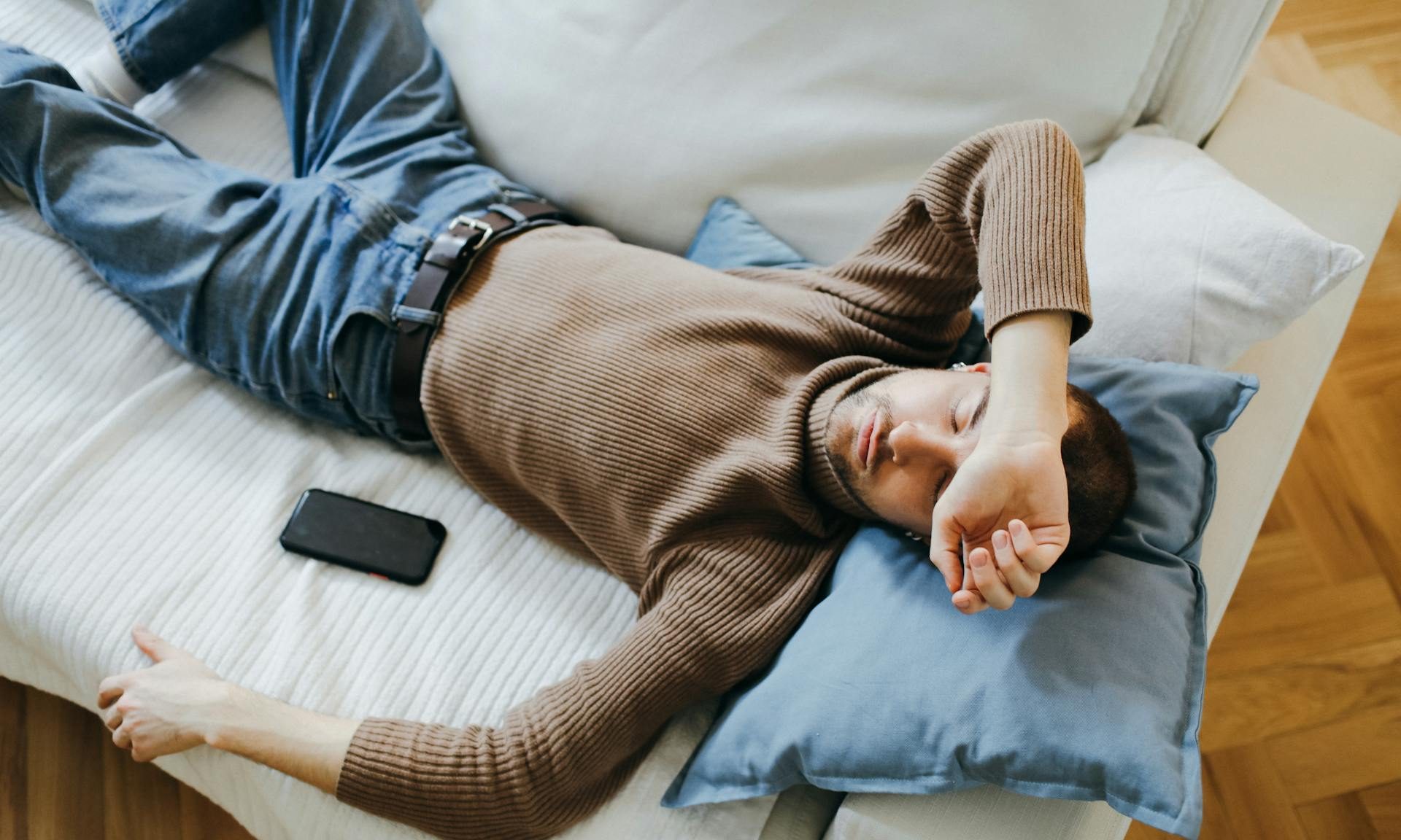 man tired laying down
