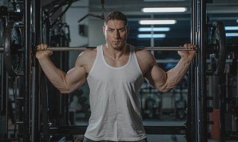 man muscle squat barbell