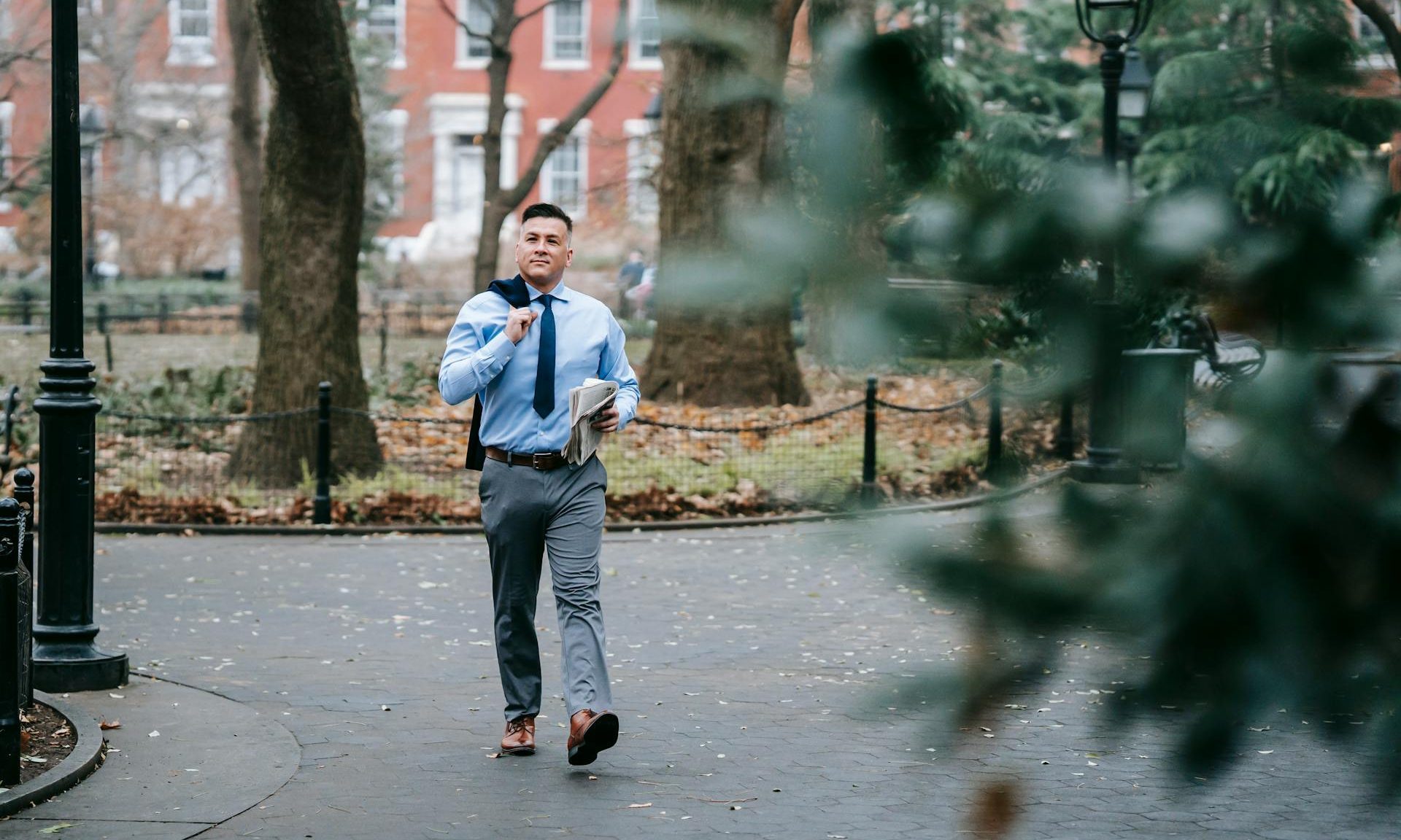 man walking outside business man