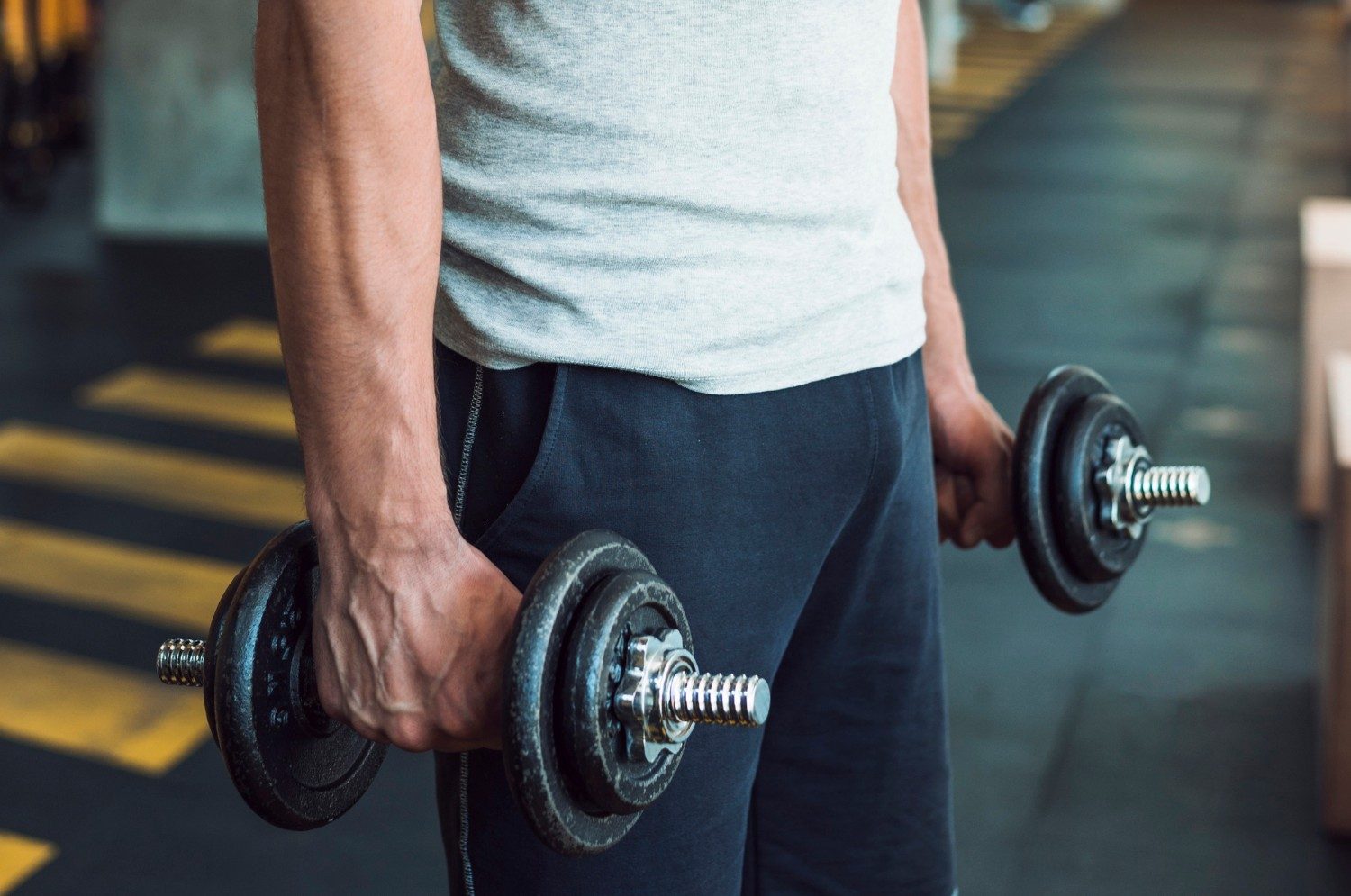 Farmers carry with dumbbells