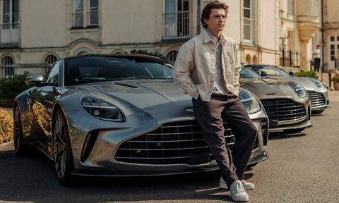 BERO alcohol-free beer brand founder Tom Holland leaning on an Aston Martin bonnet.