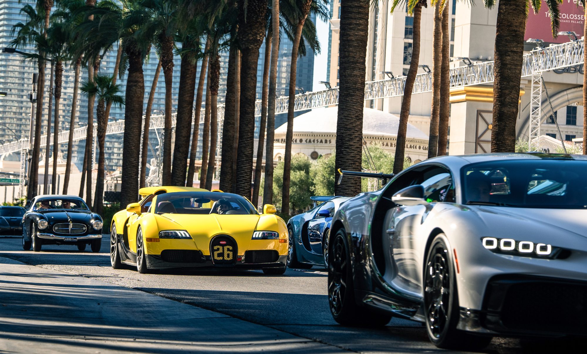 Millions of dollars worth of Bugattis in parade on the Las Vegas Strip.