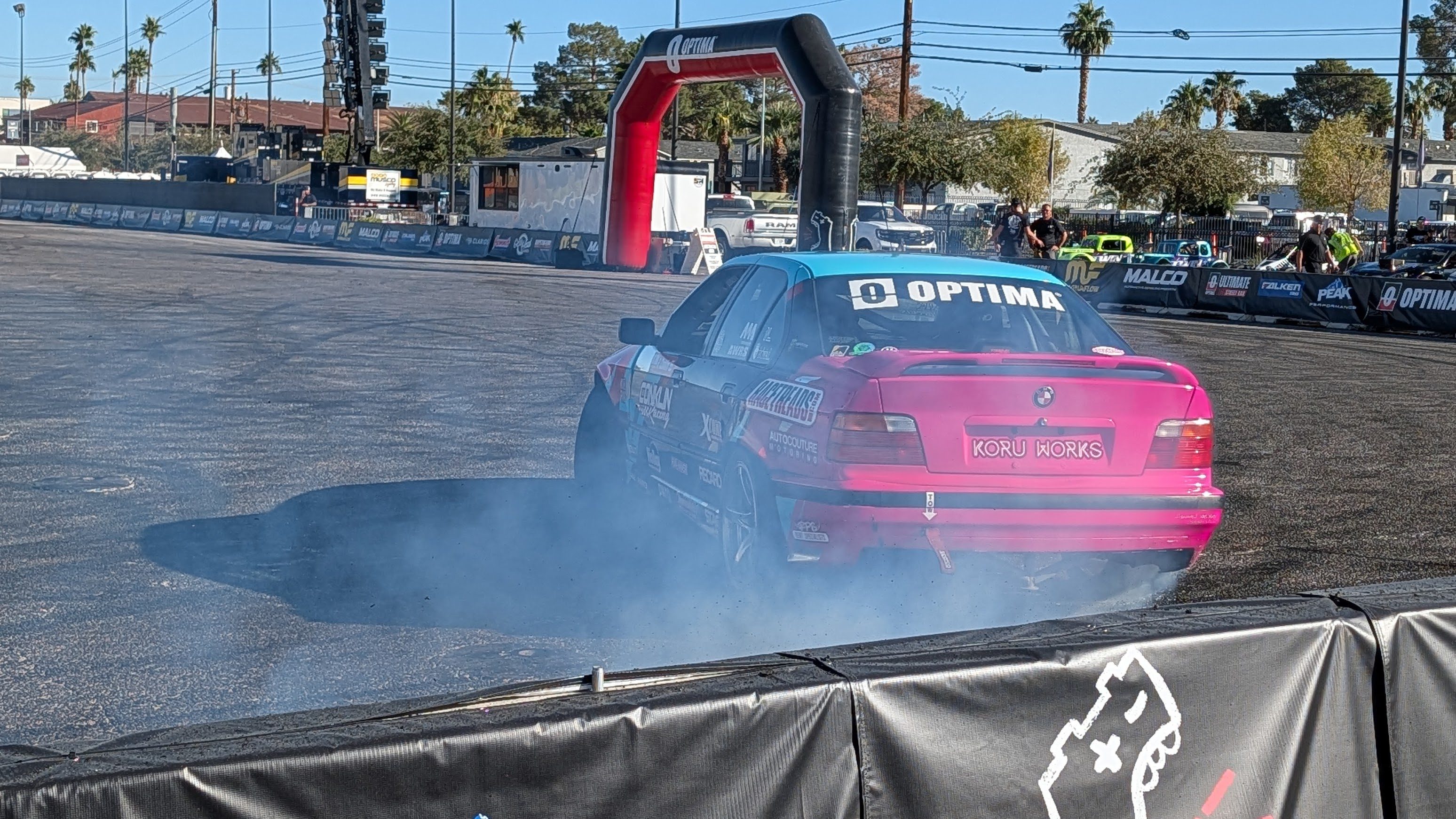 A car drifting at Optima's paddock