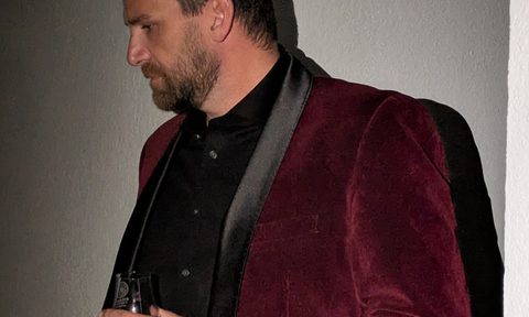 Smoking jacket drink in hand
