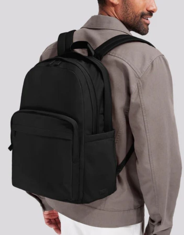 a featherlight leather backpack from Away