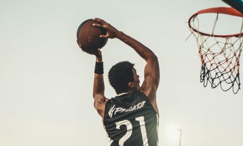 man playing basketball
