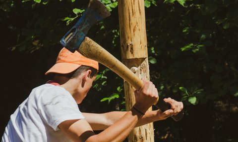 man chopping wood