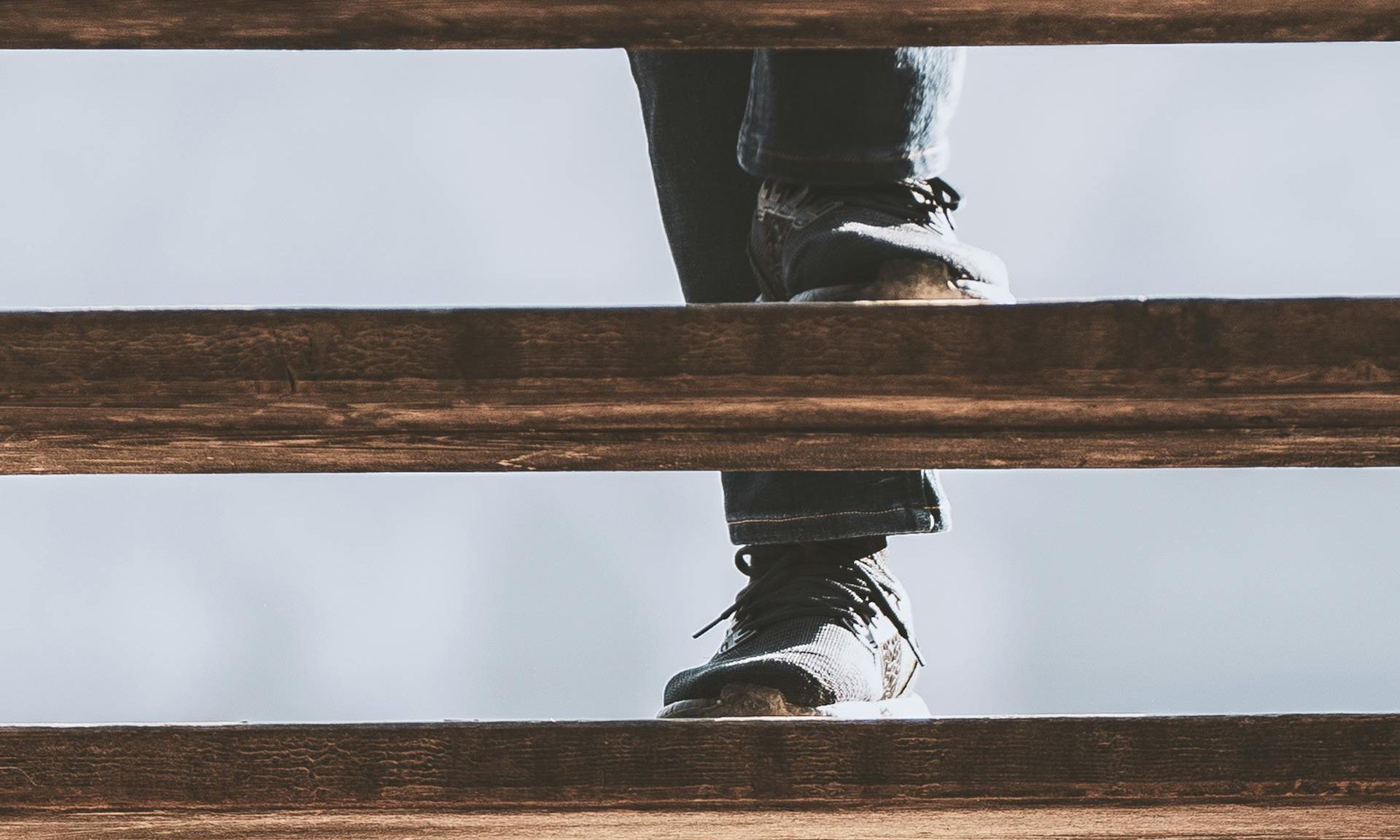 man walking up steps