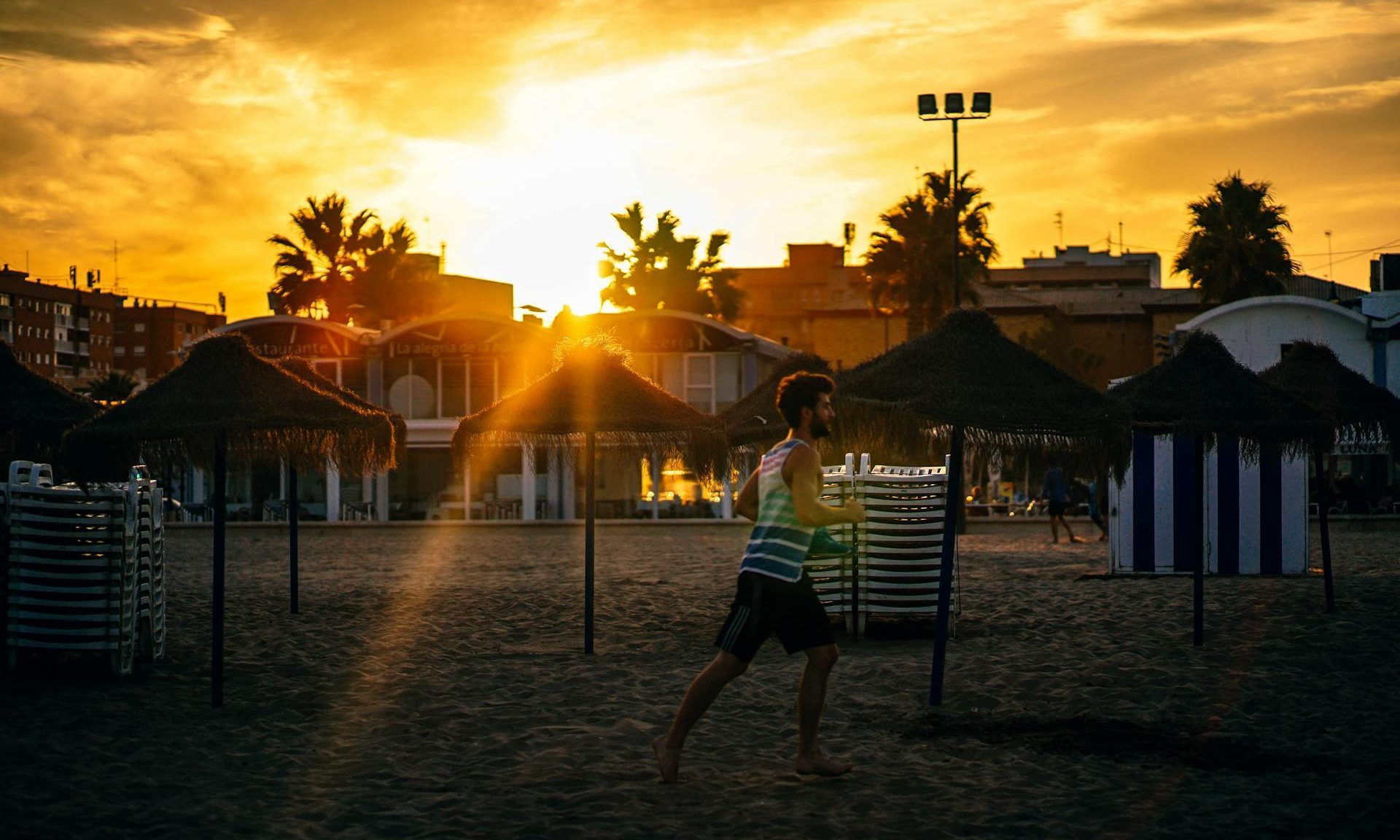 man running in the evening at sunset