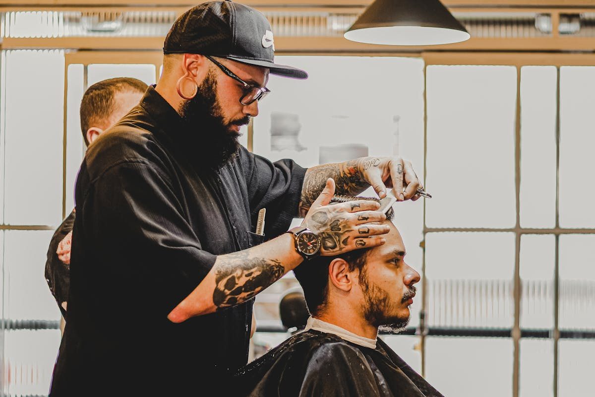 man getting head shaved