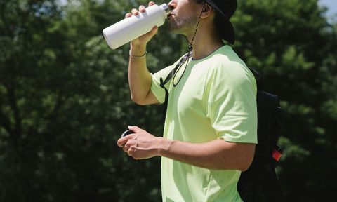 man drinking water