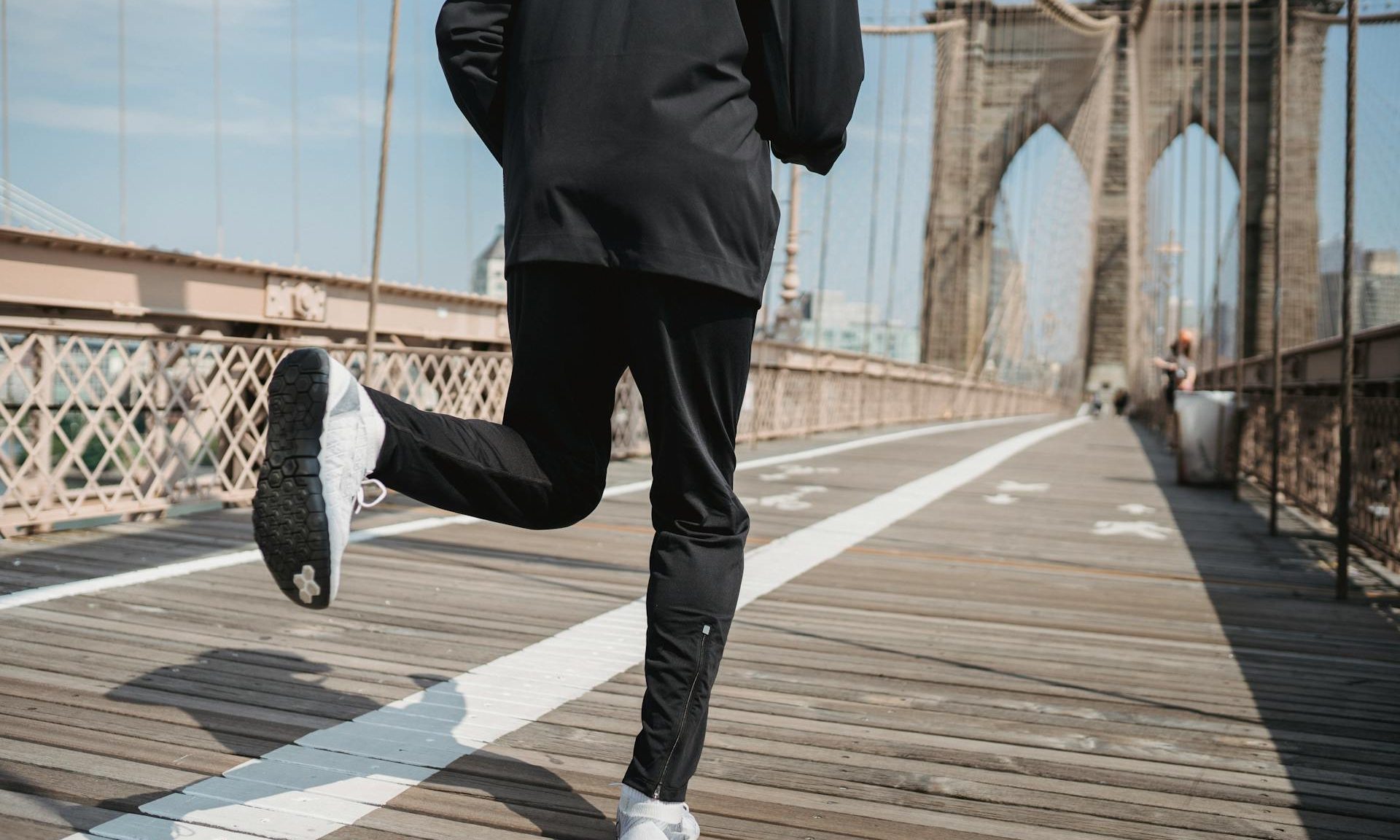 man running outside in the city