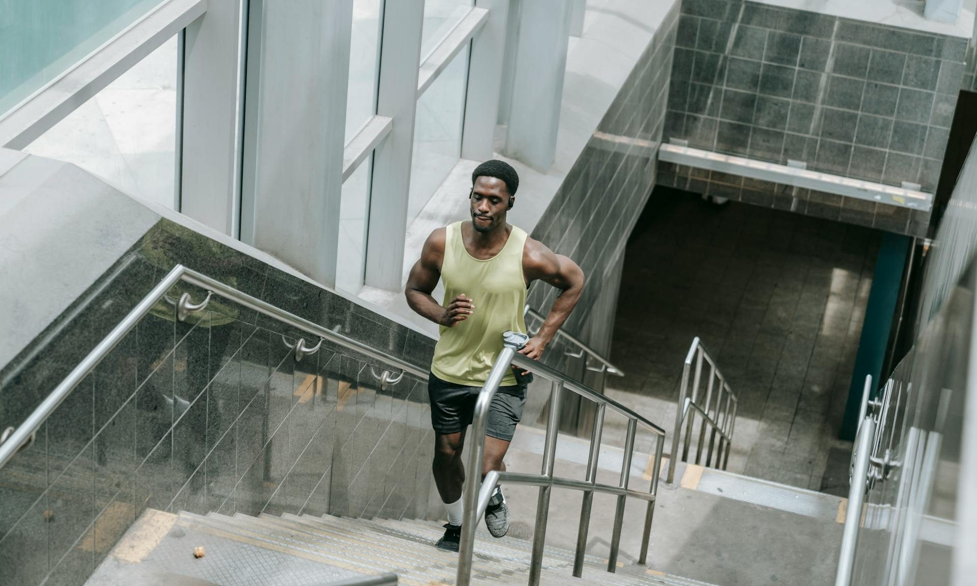 man running up stairs