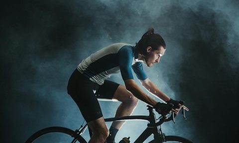 man cycling on bike