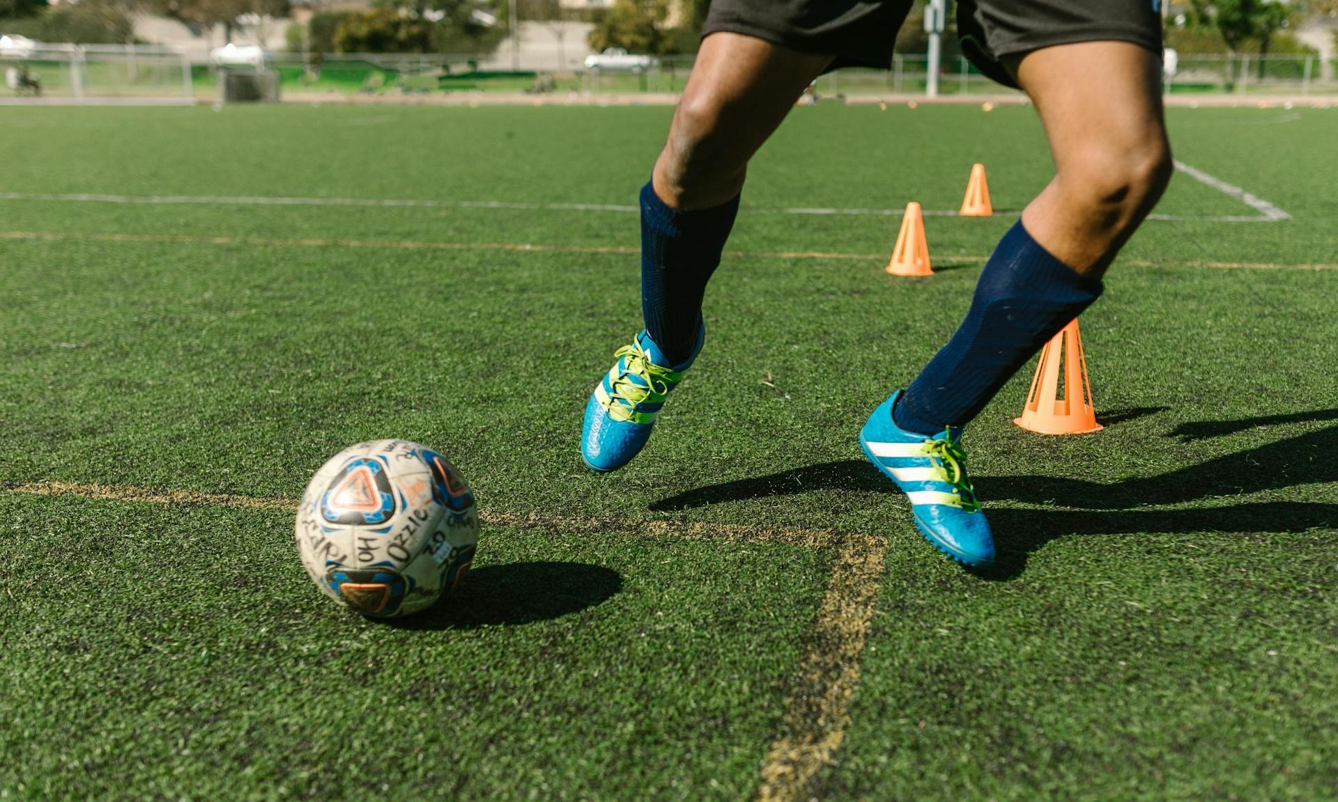 man playing football on soccer field