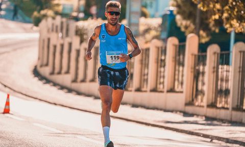 -man running in heat outside marathon