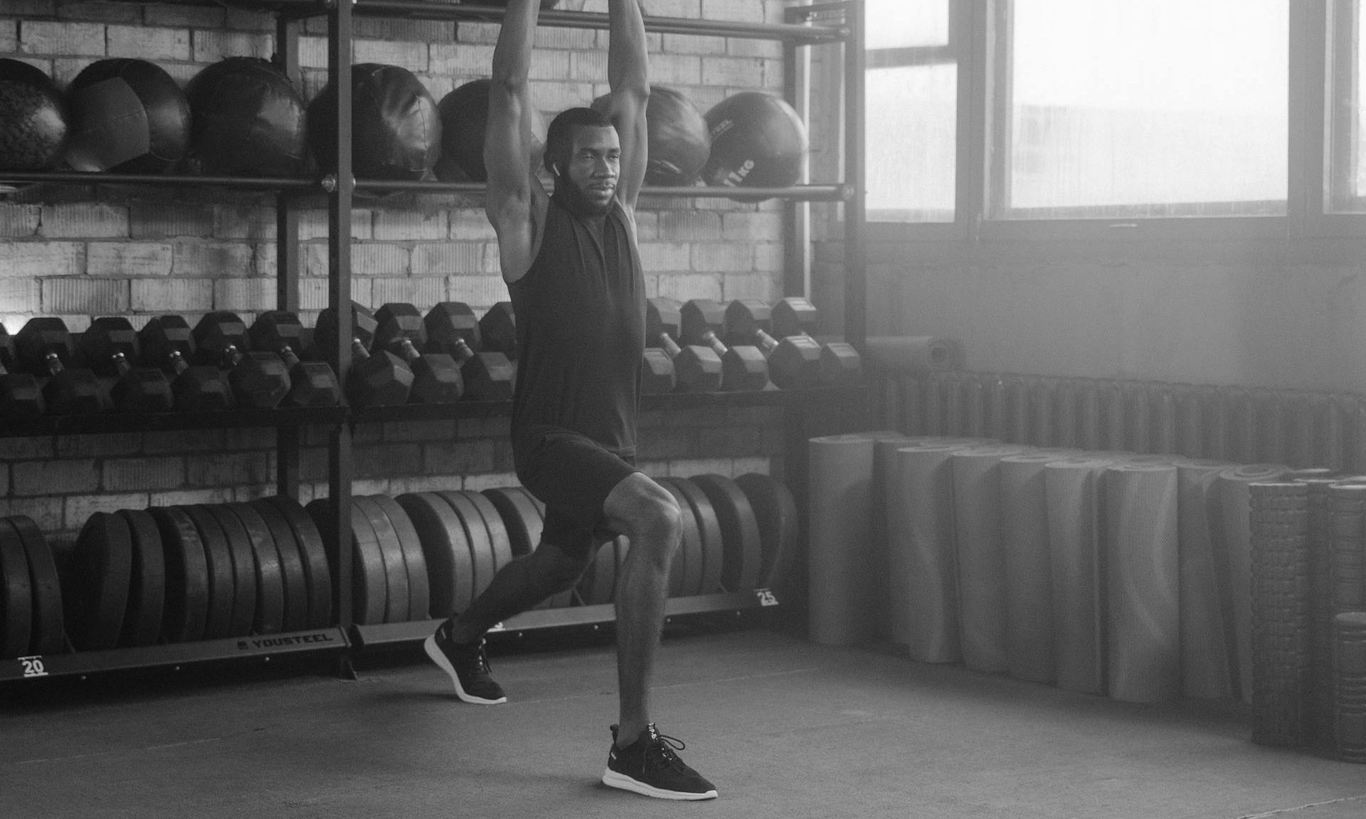 man jumping lunge work out