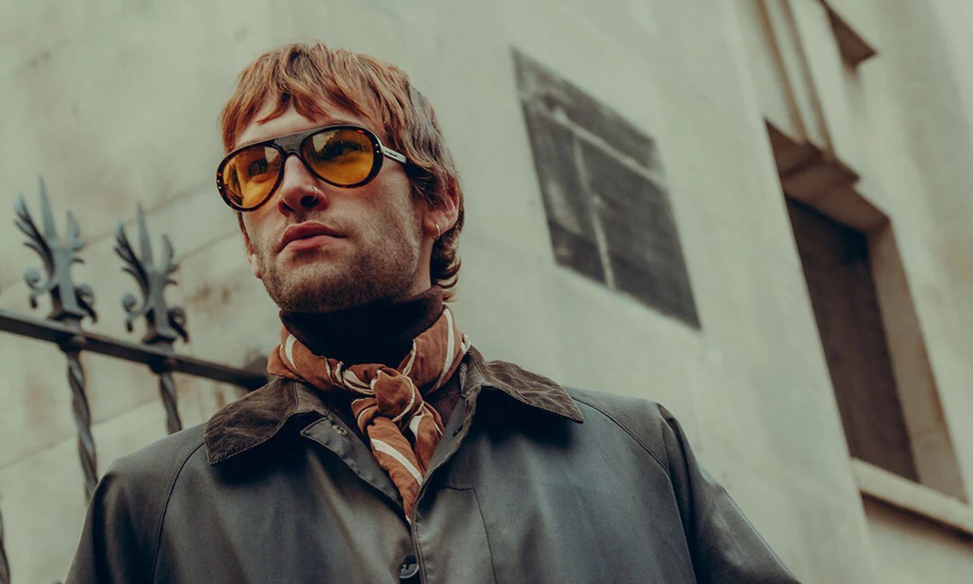 Model wearing Royal Enfield x Vallon Goan Classic Moto Aviators.