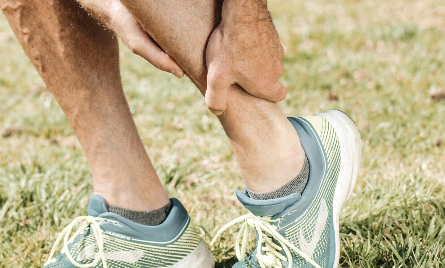 man injured pain ankle leg