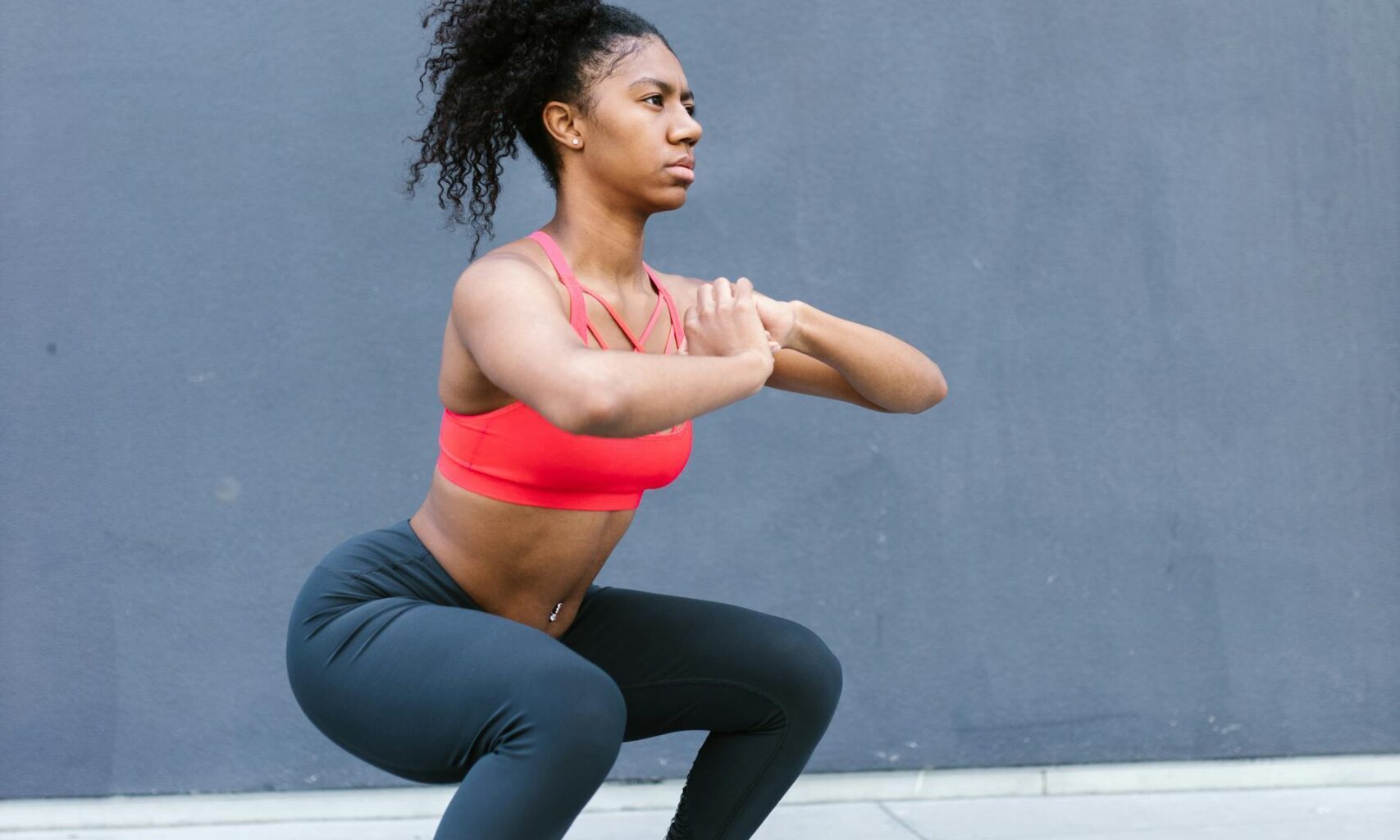 woman doing a squat