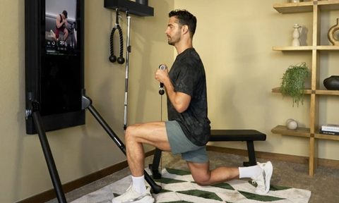 man using Tonal machine