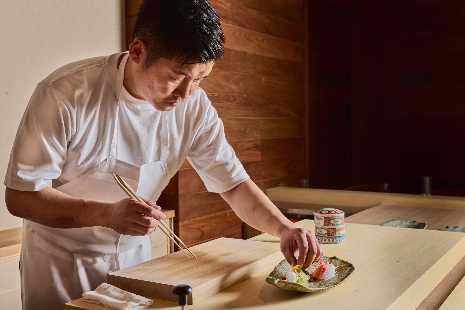 Chef Asanuma preparing sashimi