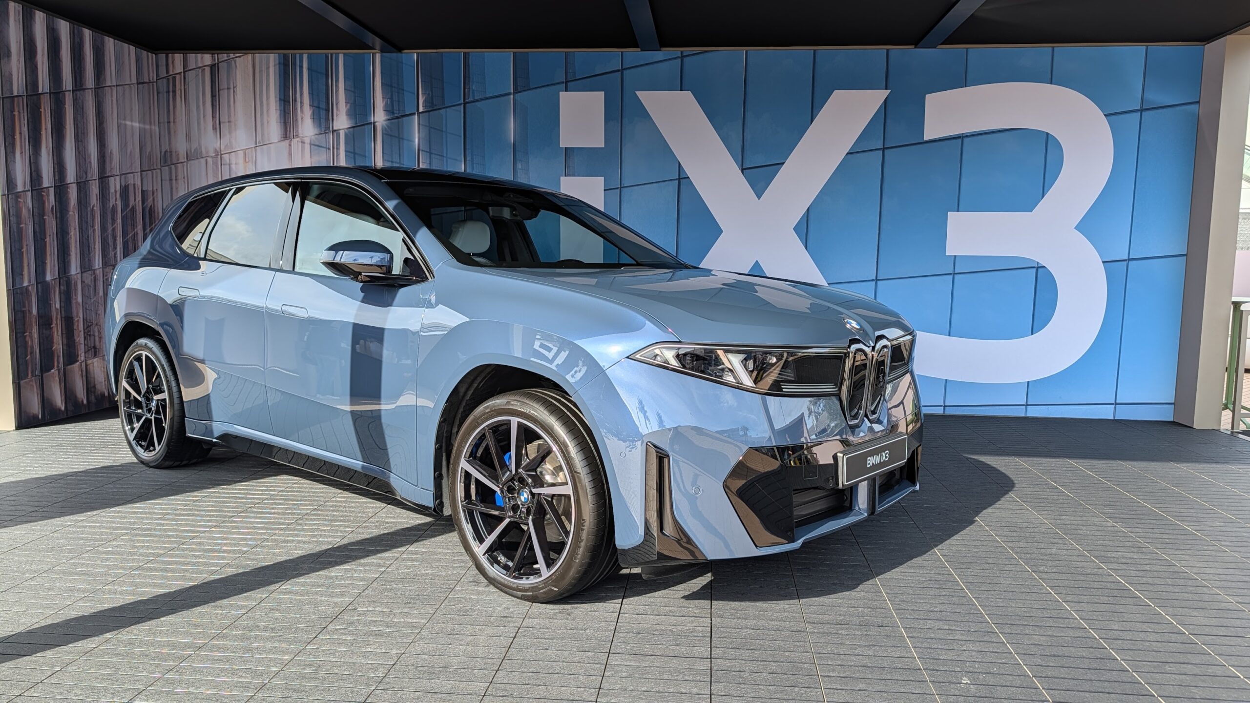 A blue 2026 BMW iX3