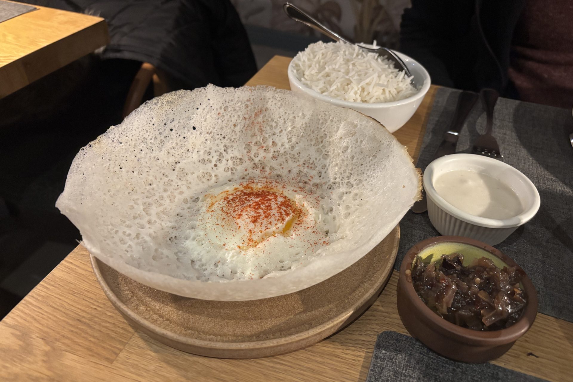 Sri Lankan egg hopper with condiments