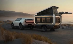 Honda Base Station electric travel trailer prototype parked on a beach.