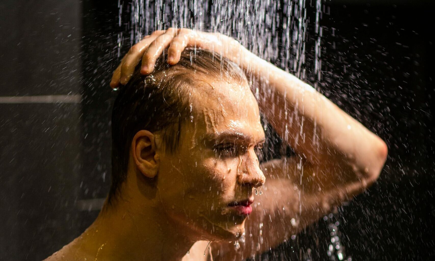 man in shower