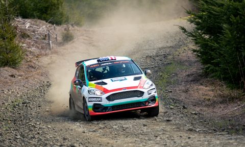 A rally car on a WRC stage