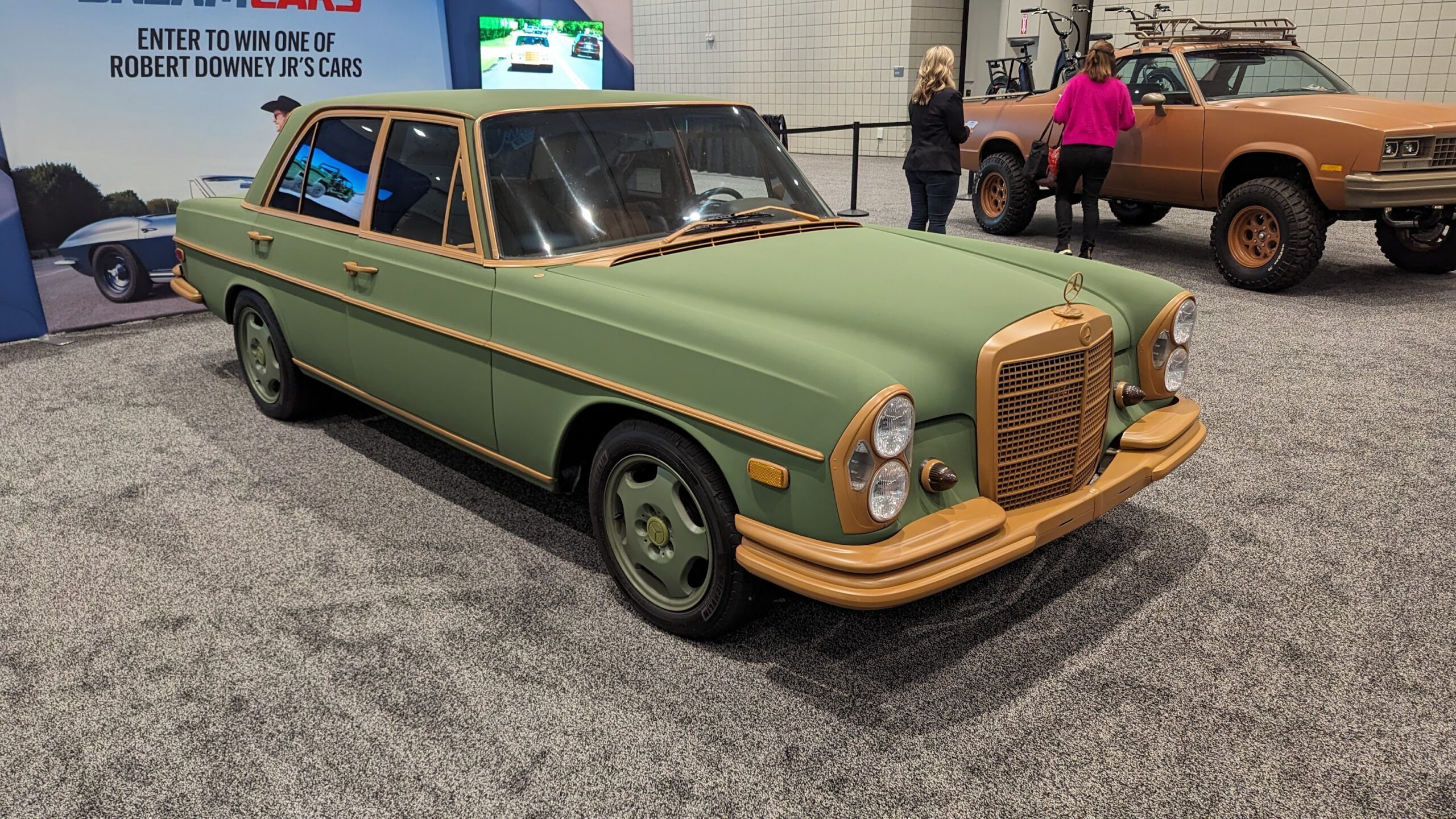 A green restomodded Mercedes owned by Robert Downey Jr.