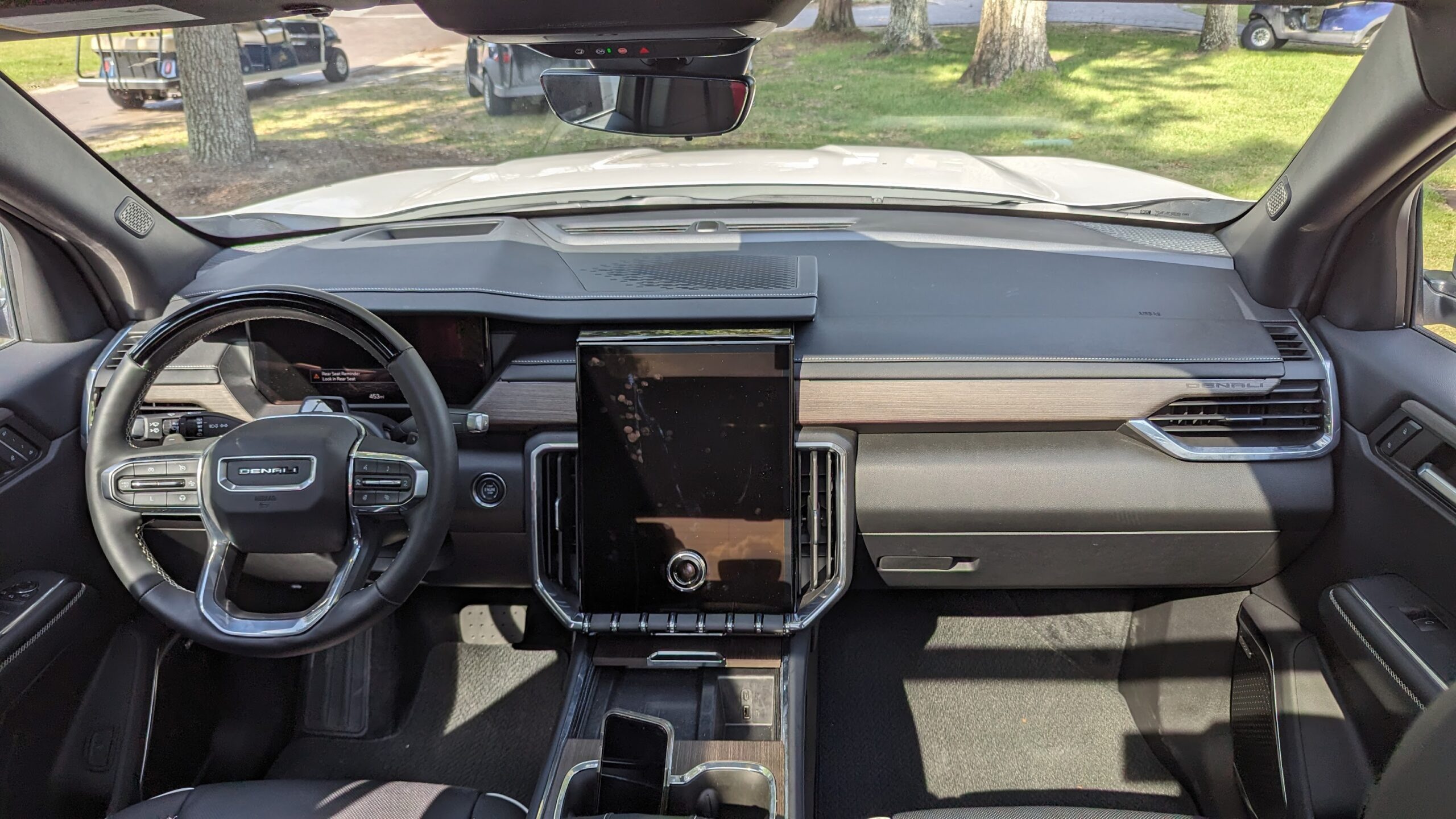 A dash in a GMC Acadia Denali