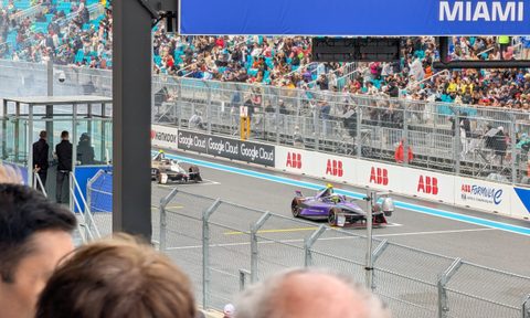 Formula E cars lined up on the grid