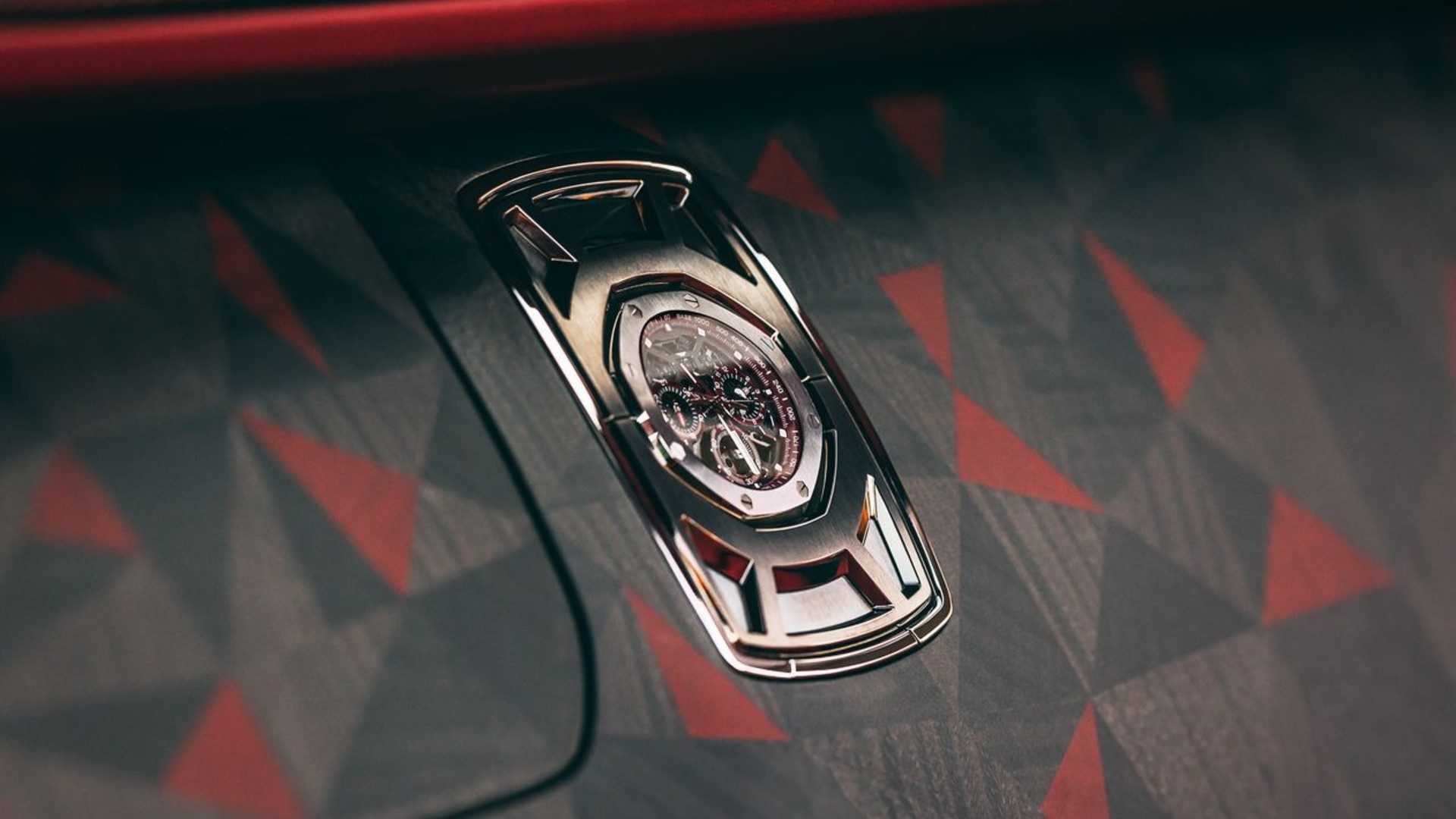 A Audemars Piguet Royal Oak on the dash of a Rolls-Royce